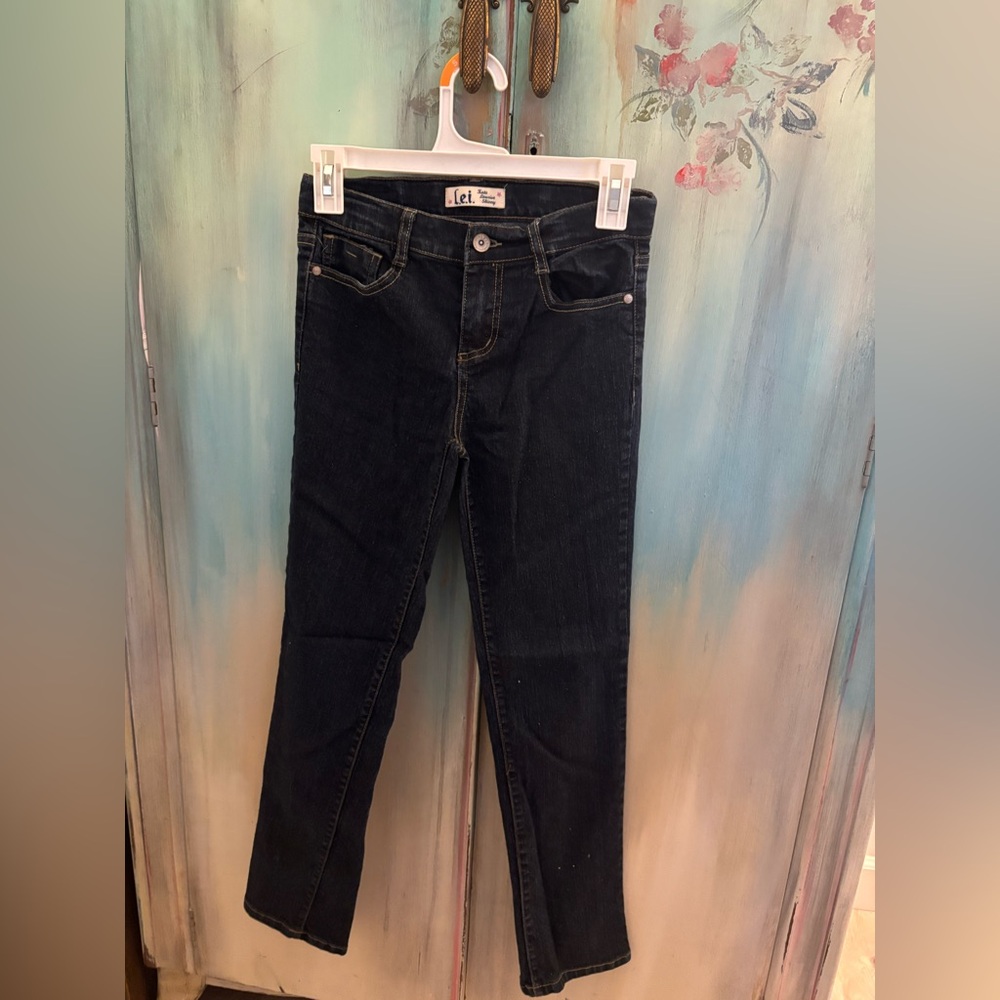 L.e.i. Kate Low rise skinny jeans.Dark blue with a mild shiny cast.Girls 12 reg